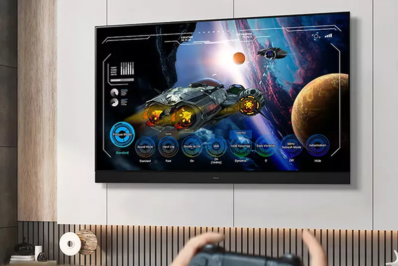 a person playing a video game on a flat screen panasonic z90b tv